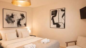 Fer et planche à repasser, lit parapluie, Wi-Fi, draps fournis