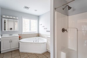 Bathtub, towels, toilet paper