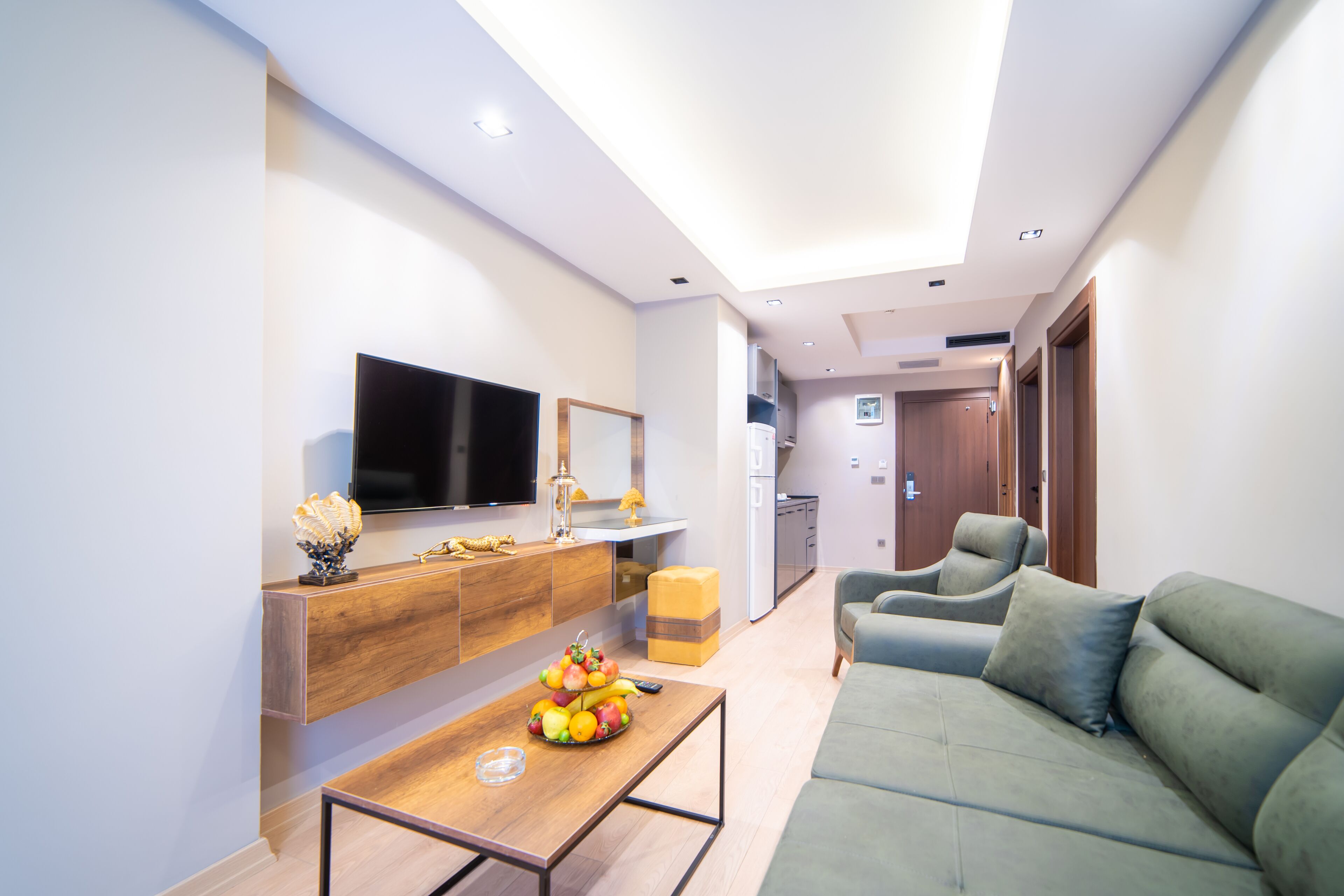 Deluxe-Suite, 1 Schlafzimmer, Raucher, Whirlpool | Wohnbereich | 107-cm-Smart-TV mit Satellitenempfang