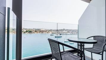 Junior Suite, 1 Bedroom, Sea View | Minibar, in-room safe, desk, laptop workspace