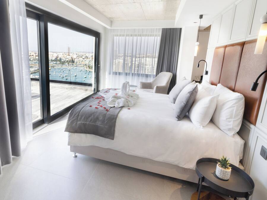 Penthouse Suite, Hot Tub, Sea View | Minibar, in-room safe, desk, laptop workspace