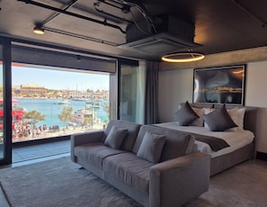 Studio Suite, Sea View | Minibar, in-room safe, desk, laptop workspace - The Londoner Hotel Sliema (Sliema)