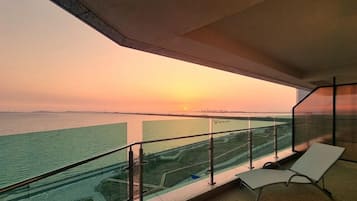 Enjoy breathtaking views of the water from this balcony.