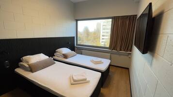 Double or Twin Room | Desk, laptop workspace, blackout drapes, iron/ironing board