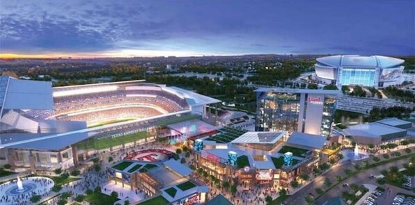 Experience the vibrant heart of the city at this dynamic complex, featuring a large stadium and a mix of shops, dining, and entertainment options.