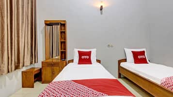 Espacio para trabajar con laptop, wifi gratis y ropa de cama