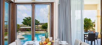 Massive pool villa with golf course and ocean views