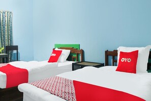 Espacio para trabajar con laptop, wifi gratis y ropa de cama 
