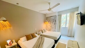 A hotel room with two beds, a ceiling fan, a TV, and a window with curtains. - 2BDR Apt Specially designed Morros 922. Host:ID+10 (Cartagena de Indias)