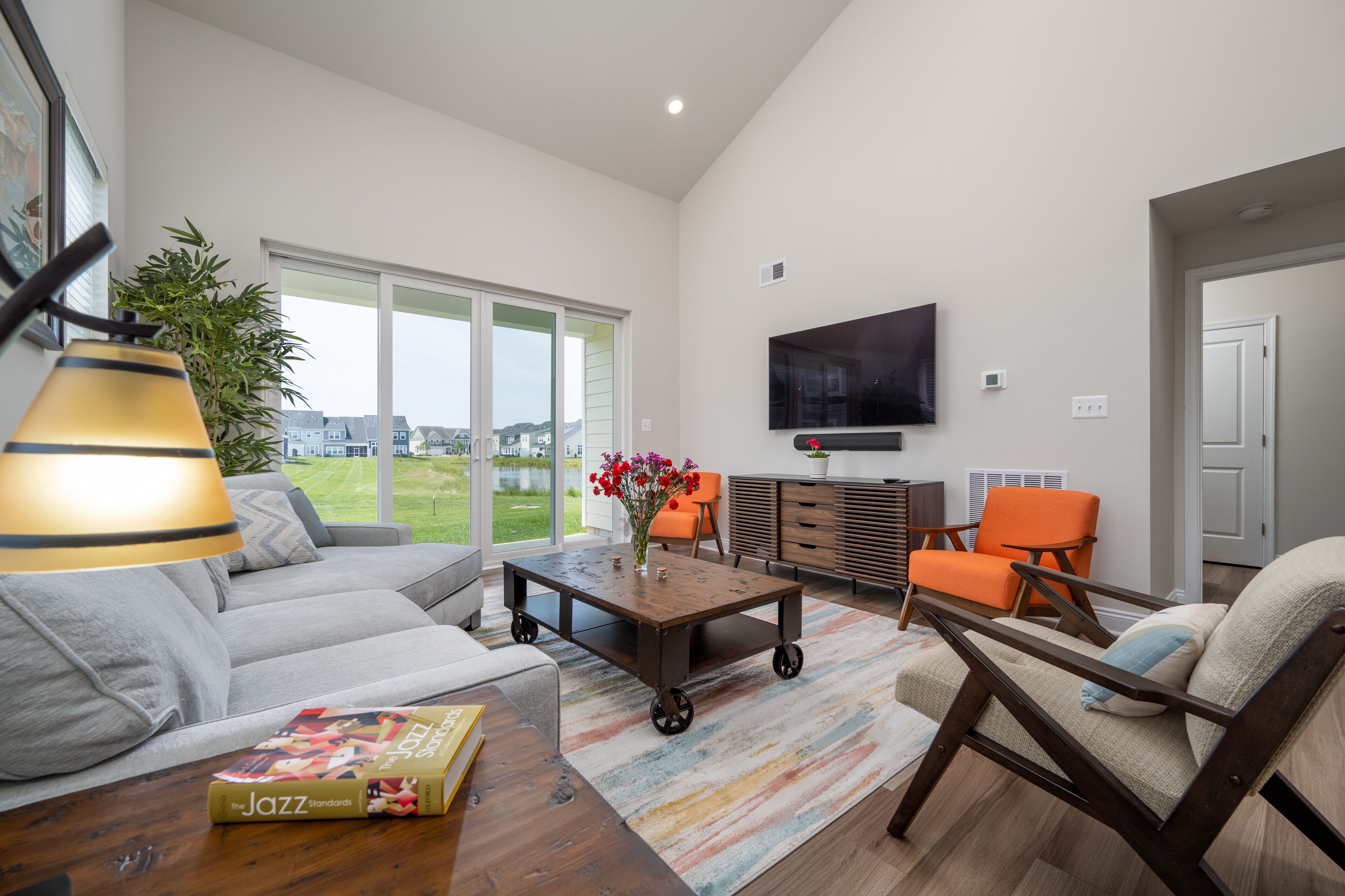 Newly built end unit townhouse with Pond views in The Peninsula!