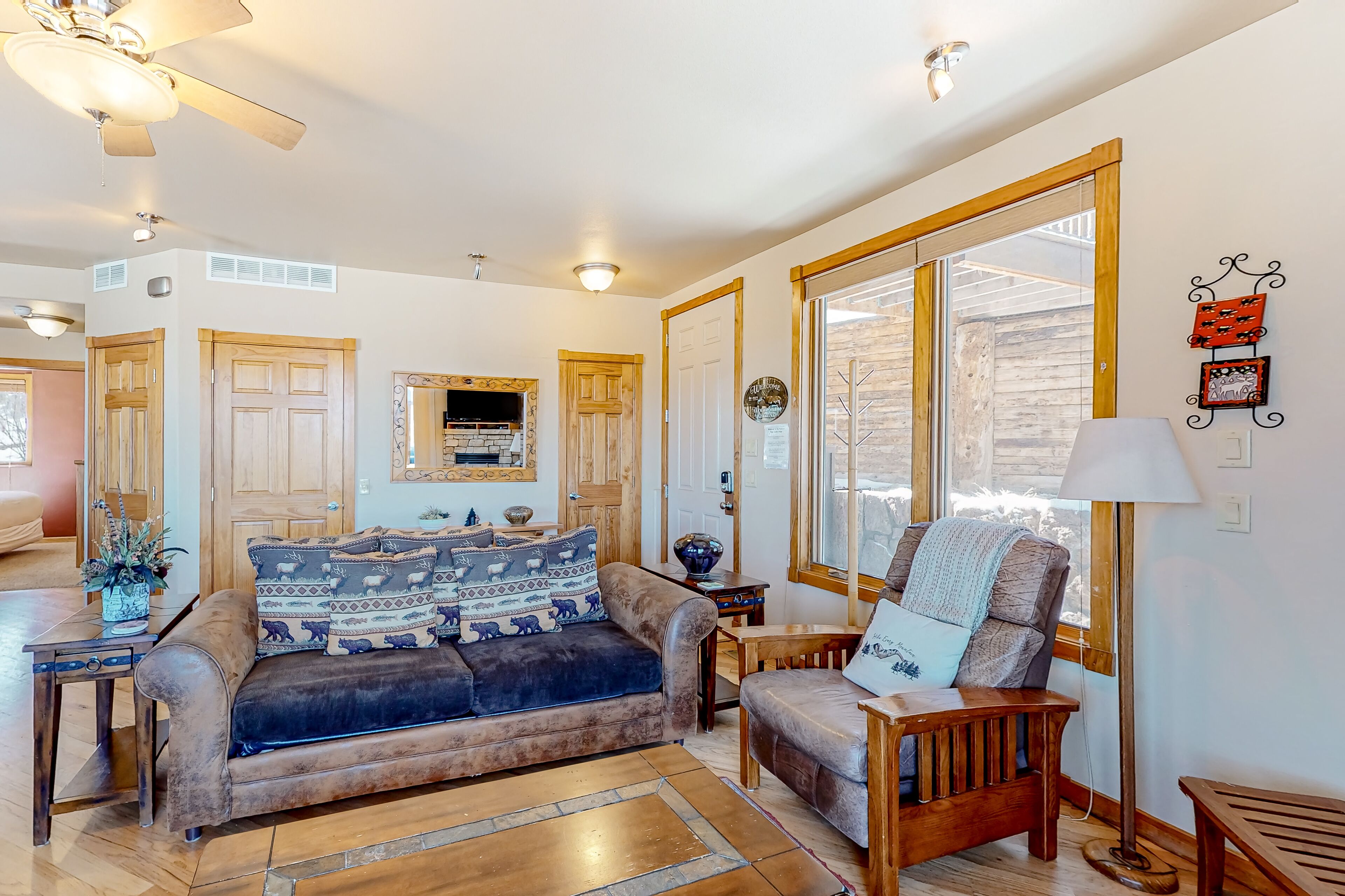 Mountain-view condo with deck, hot tub, gas fireplace, & W/D - quiet location