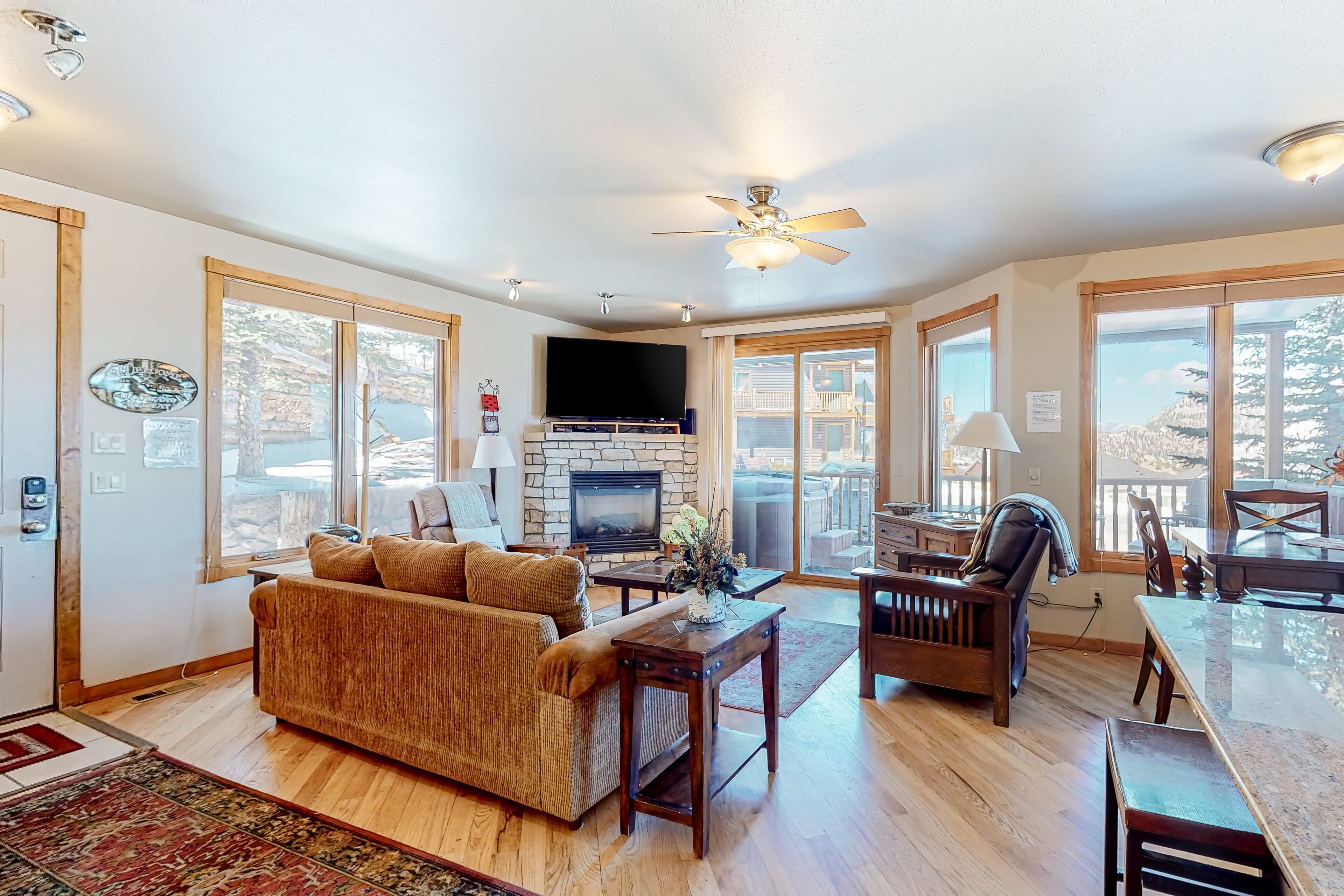 Mountain-view condo with deck, hot tub, gas fireplace, & W/D - quiet location