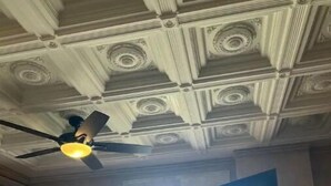 A room with a bed, a ceiling fan, and a door leading to an outdoor balcony. - Two master suites in historic downtown (Luray)