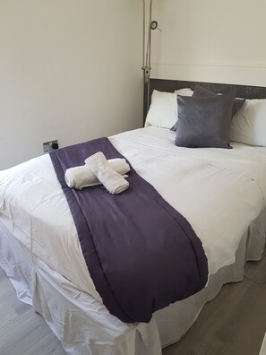 Standard Apartment, Multiple Beds | Desk, iron/ironing board, bed sheets - Oriental Holiday Flats (Blackpool)