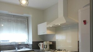 Fridge, oven, stovetop, dishwasher - Gite DU Jardinet - Saint-andre-du-bois (SAINT-ANDRE-DU-BOIS)