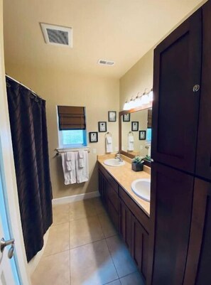 Hair dryer, towels, soap, shampoo