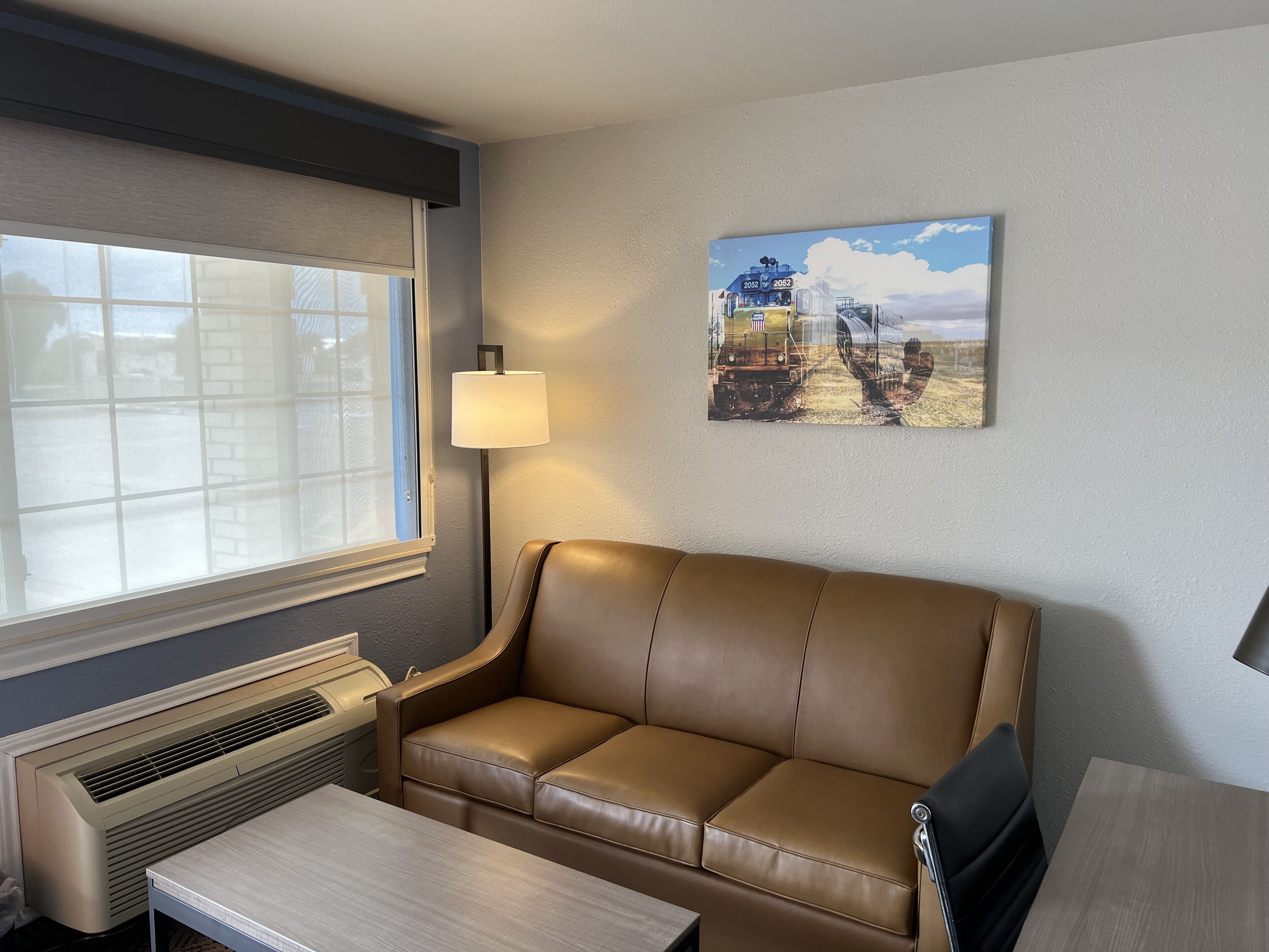 Standard Suite | Living area | 39-inch LCD TV with satellite channels