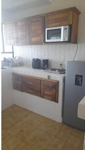 Fridge, toaster, cookware/dishes/utensils