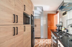Căn hộ Superior, 3 phòng ngủ, ban công, quang cảnh thành phố | Bếp riêng | Tủ lạnh, lò vi sóng, lò nướng, lò nướng bánh mì