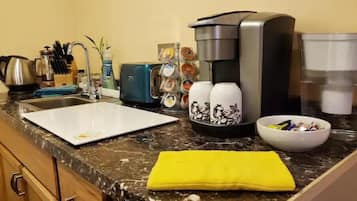 Fridge, microwave, coffee/tea maker, toaster