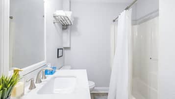 Hair dryer, towels, soap, shampoo