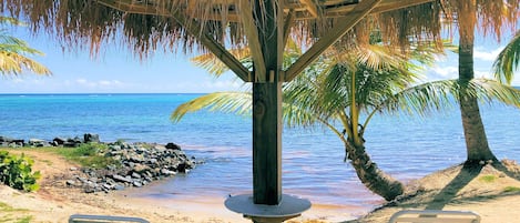 On the beach, sun loungers, beach towels
