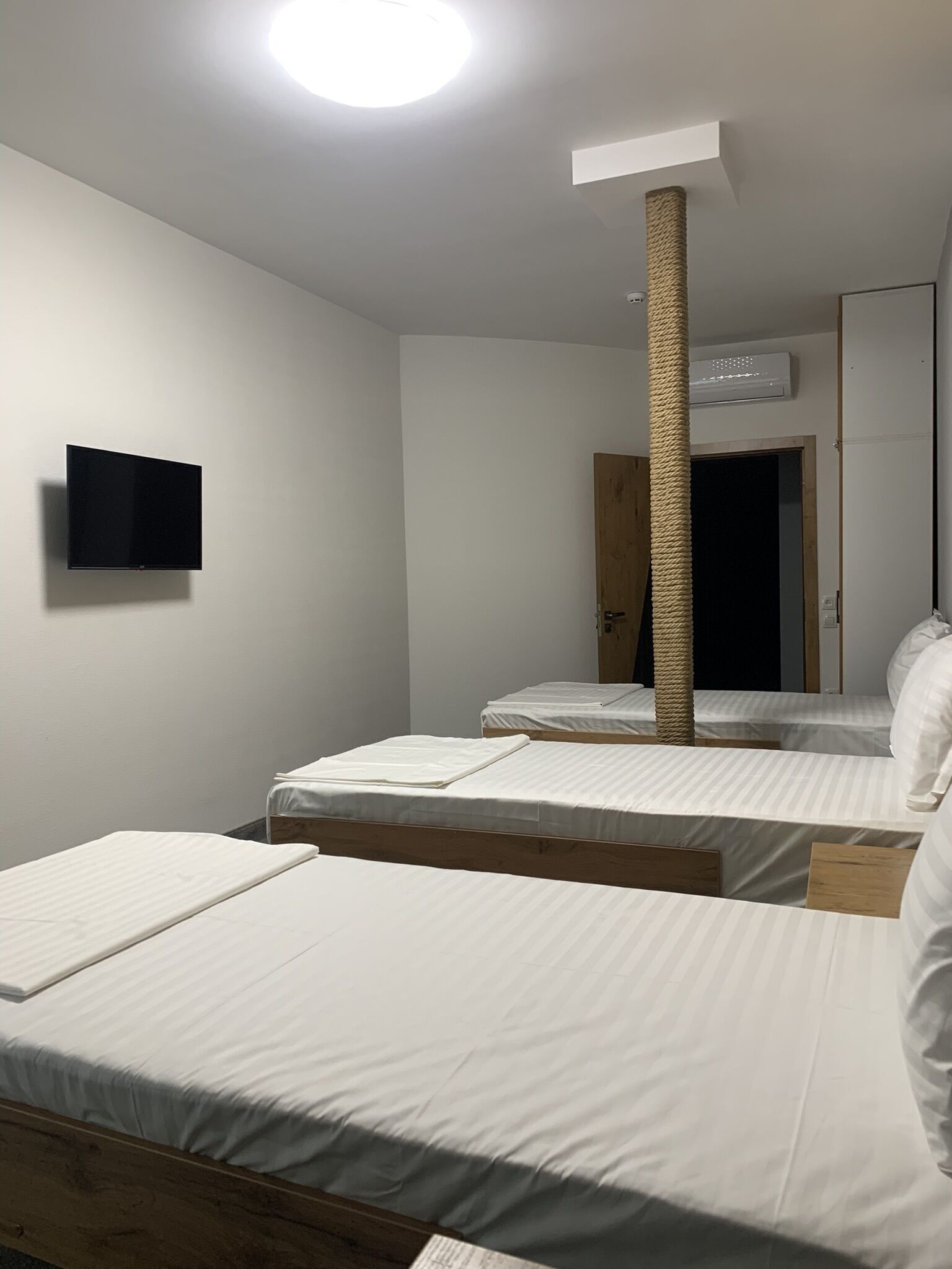 Premium bedding, desk, blackout curtains, soundproofing