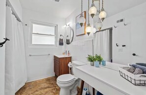 Shower, hair dryer, towels, soap