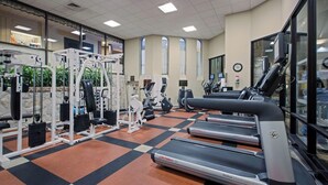 A gym with treadmills, weight machines, and exercise equipment. - Reading Vitality Hotel (Wyomissing)