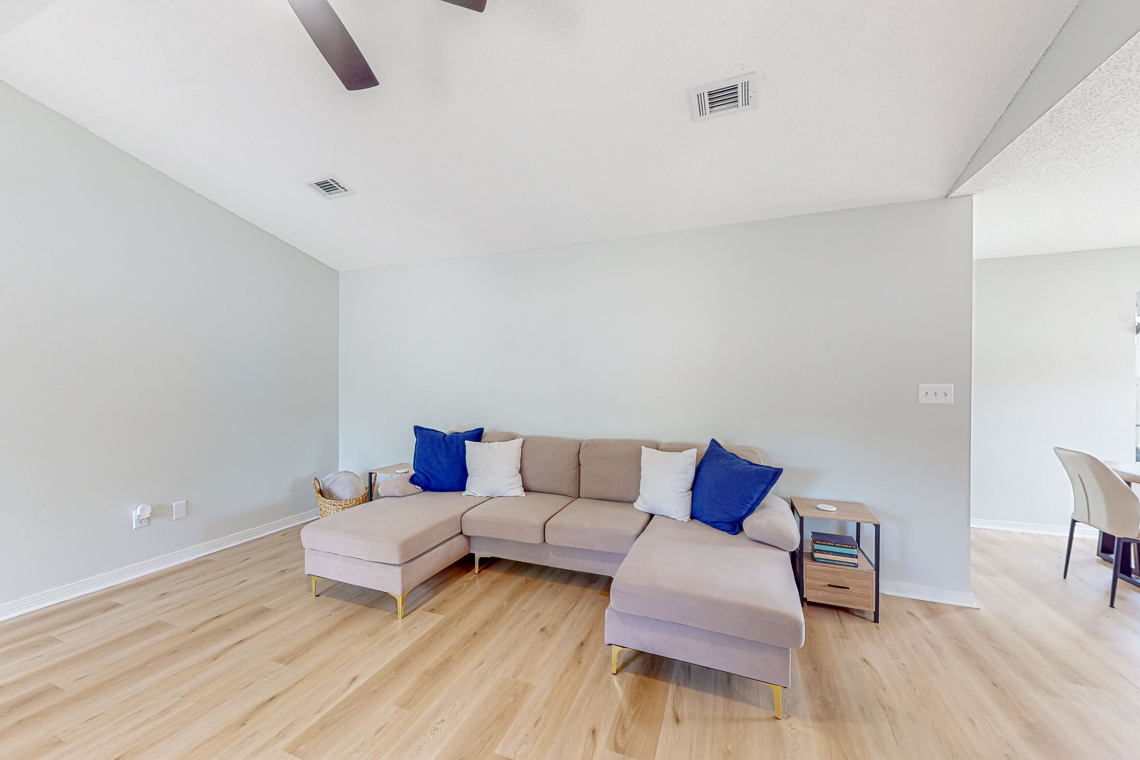 Dog-friendly home with fenced yard, grill, central AC, & washer/dryer