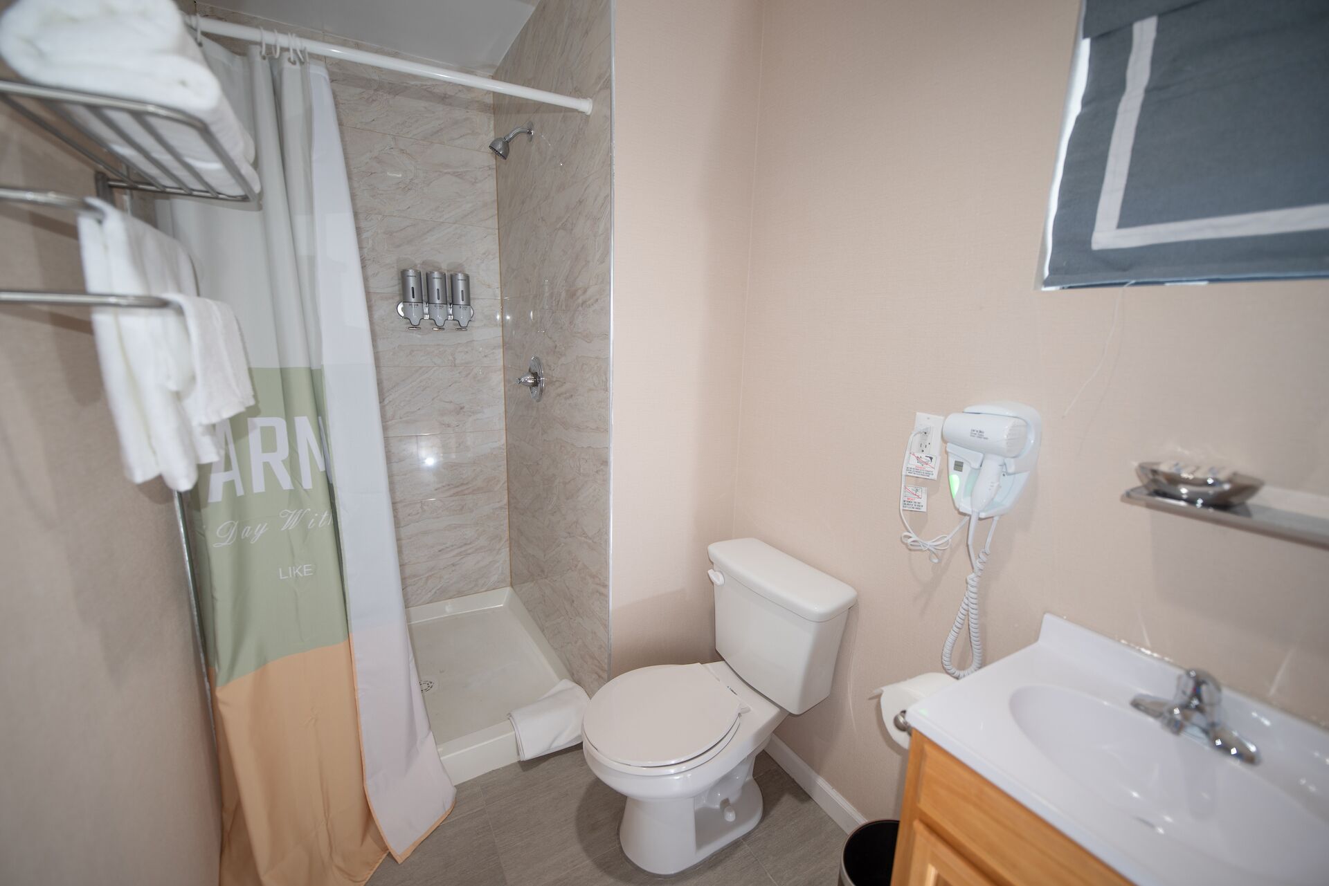 basic room, 1 queen bed | bathroom | hair dryer, bathrobes, towels, soap