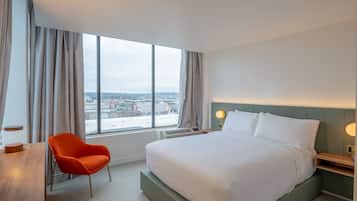 Premium bedding, pillow-top beds, minibar, in-room safe