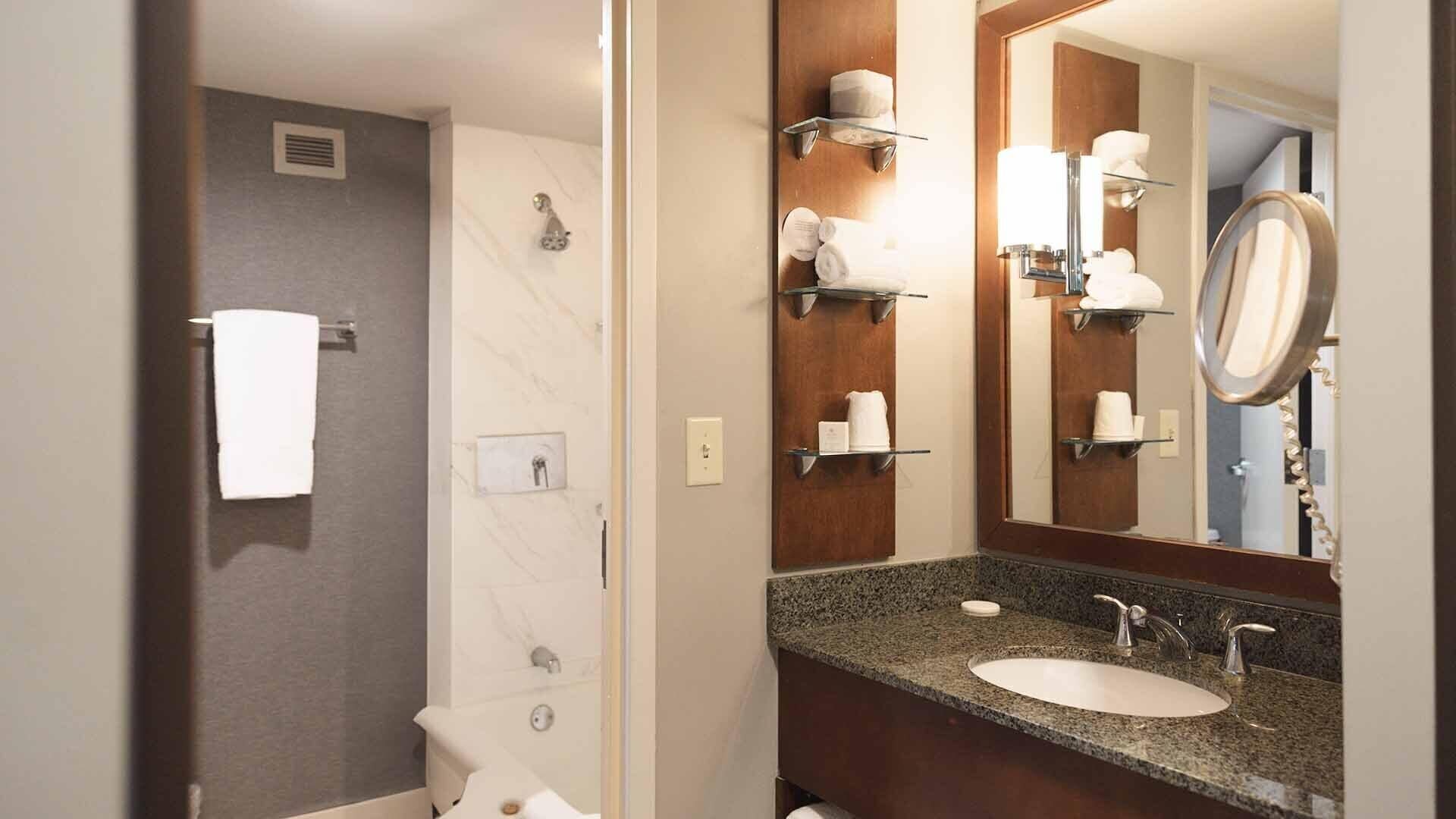 junior suite | bathroom | rainfall showerhead, free toiletries, hair dryer, towels
