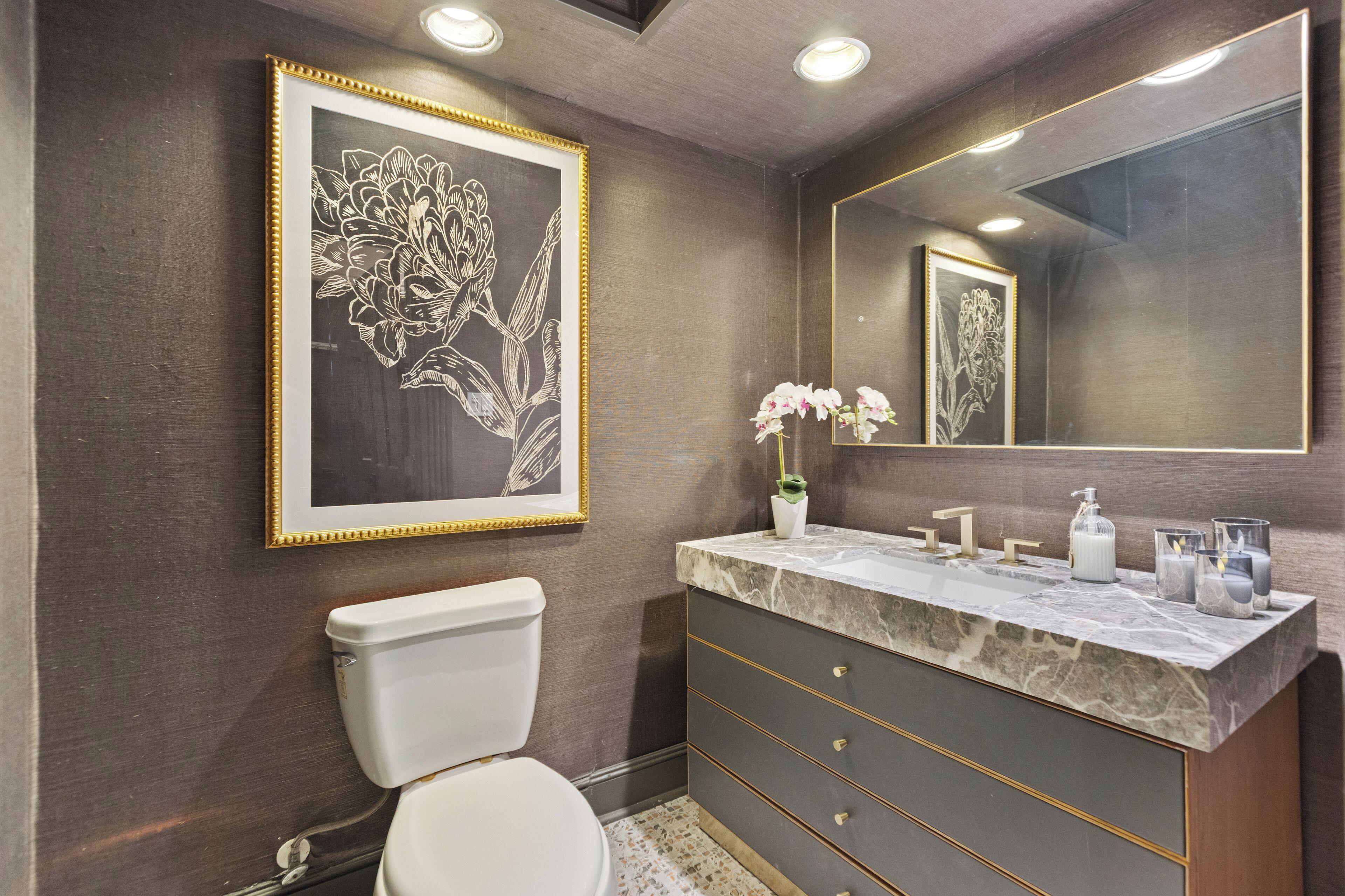 A stylish powder room for added convenience during your visit