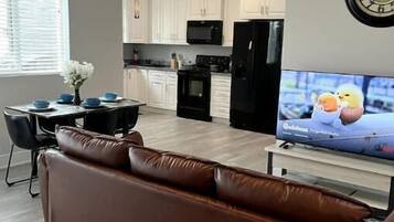 Smart TV, fireplace, books