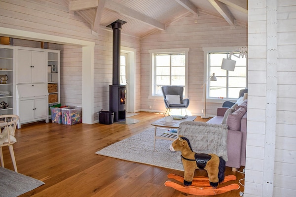 Una Smart TV, una chimenea