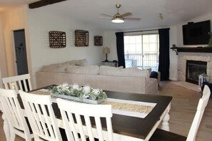 Smart TV, fireplace, books