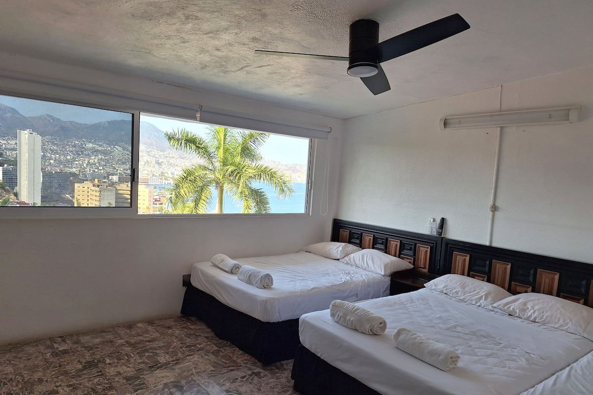 Family Room, Multiple Beds, Air conditioning, Ocean View | In-room safe, blackout curtains, iron/ironing board, free WiFi
