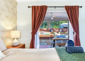 Master bedroom with french doors to the patio