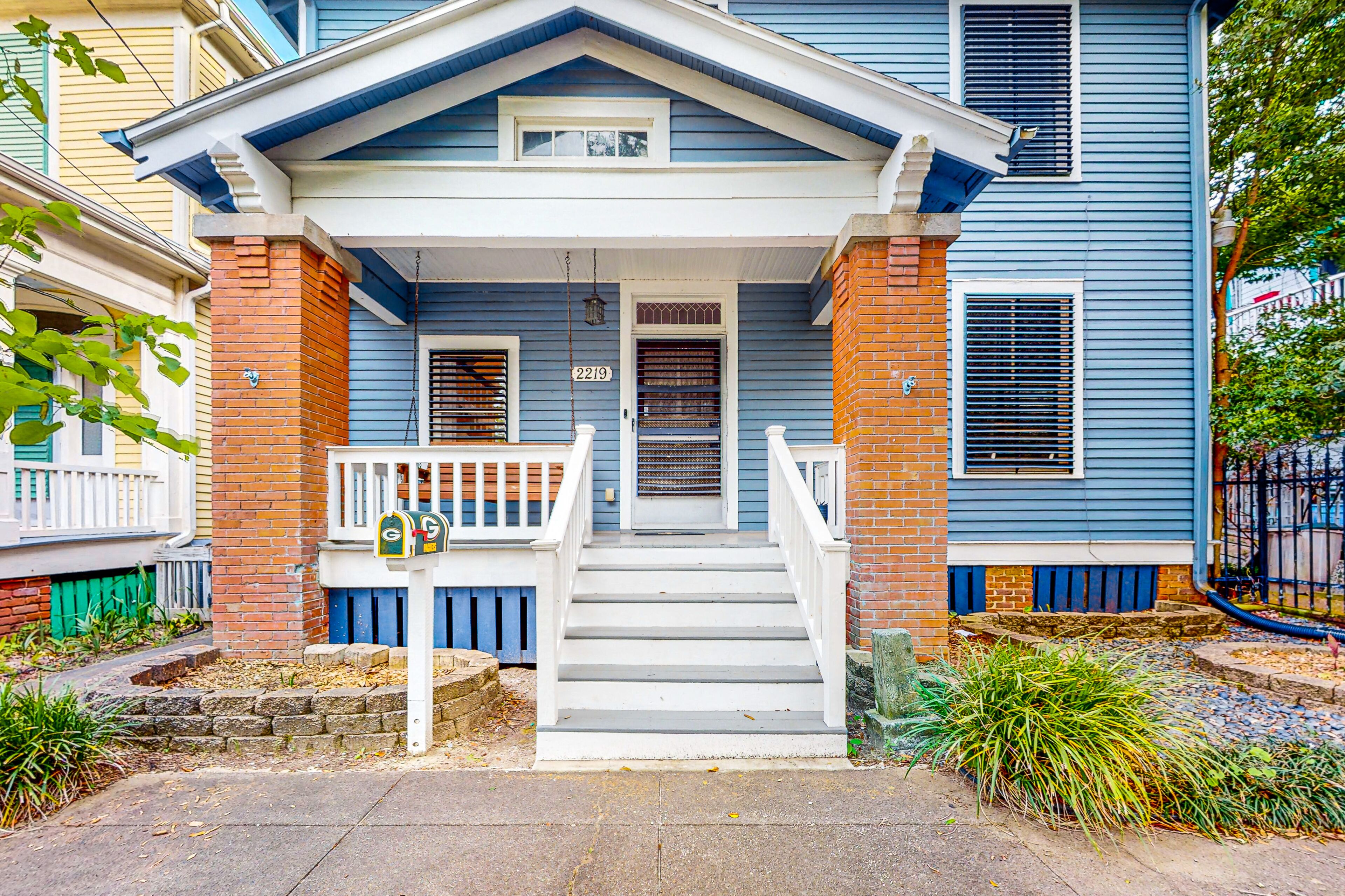 Dog-friendly home with enclosed yard, balcony, AC, W/D, & central location