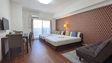 Premium bedding, desk, laptop workspace, blackout curtains