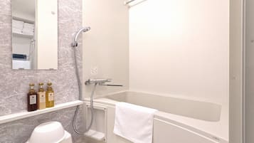 Separate tub and shower, free toiletries, hair dryer, slippers