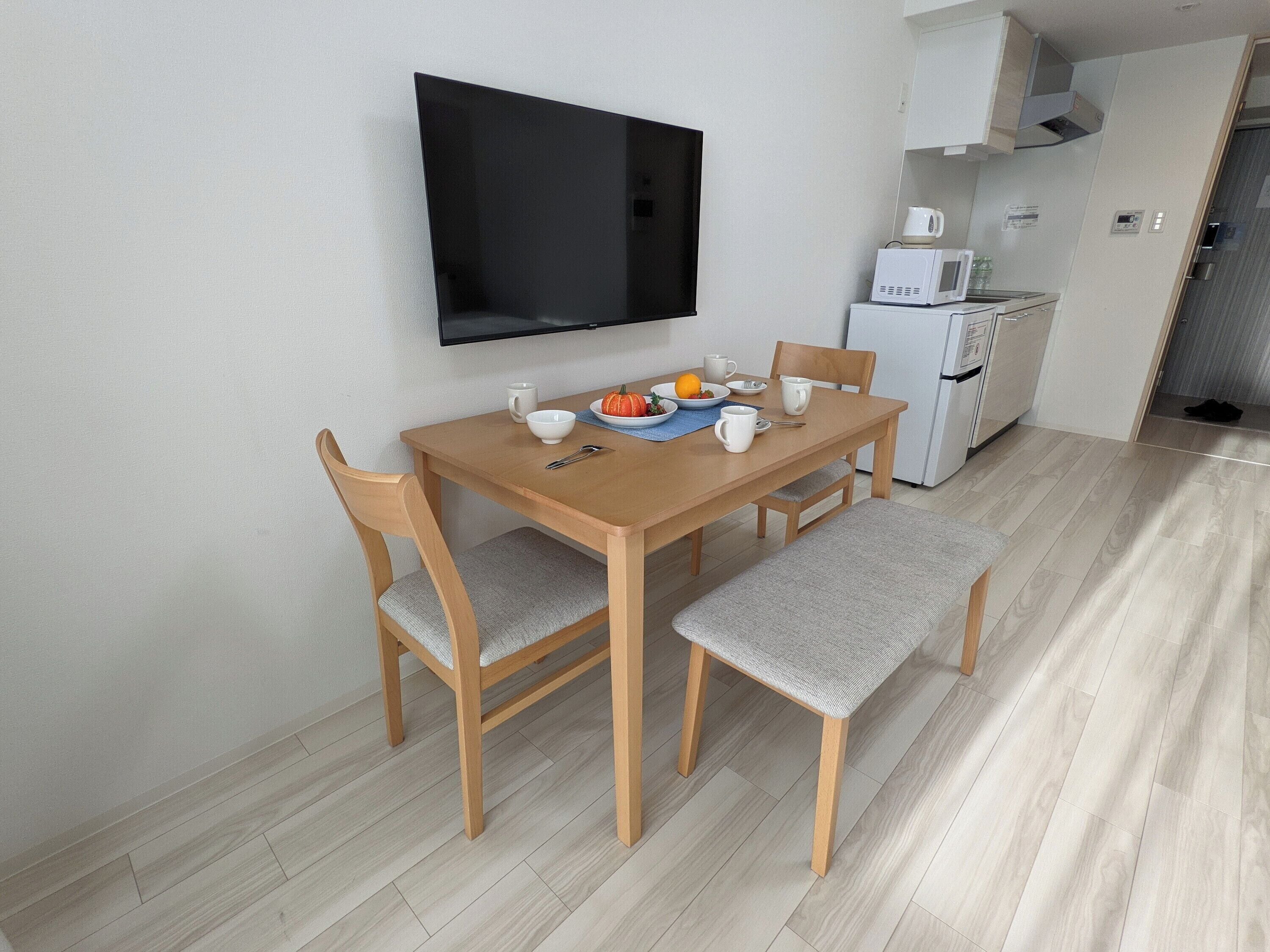 Habitación triple Deluxe | Ropa de cama de alta calidad y cortinas opacas