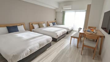 Deluxe Triple Room | Premium bedding, blackout drapes, iron/ironing board (on request)