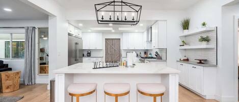 Coffee/tea maker, fridge, microwave, oven
