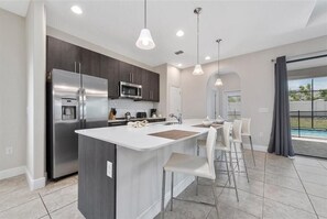 Fridge, microwave, oven, stovetop - 224MCV: 4 Bed Luxury Resort Pool Home w/ Water Park-Near Legoland (Haines City)