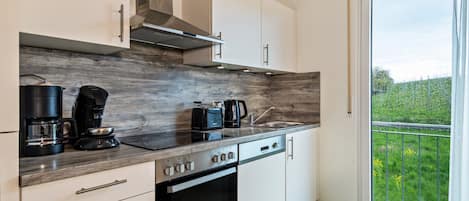 Réfrigérateur, four, plaque de cuisson, lave-vaisselle