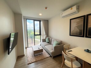 Deluxe Apartment, Golf View | Living area | 42-inch Smart TV with cable channels, TV - Apartment at Sky Park Condo by Lofty  (Choeng Thale)
