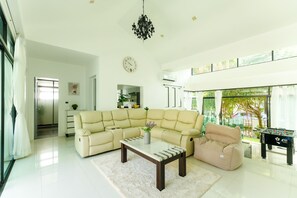 Deluxe Villa, Private Pool | Living area | 40-inch Smart TV with cable channels, TV