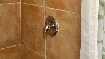 Shower, towels, soap, shampoo